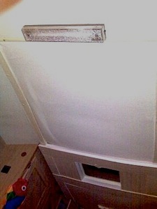 Mobile phone photograph of the caravan ceiling.