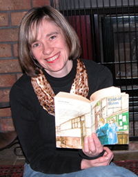 Colour photograph of Liz Filleul, reading Antonia Forest's End of Term